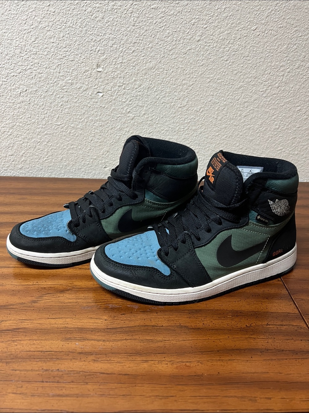 Nike High-Top Sneakers in Black, Green, and Blue